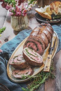 Sliced Flank Steak with prosciutto, cheese, and mixed herbs