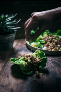 Garnishing with a final squeeze of lime