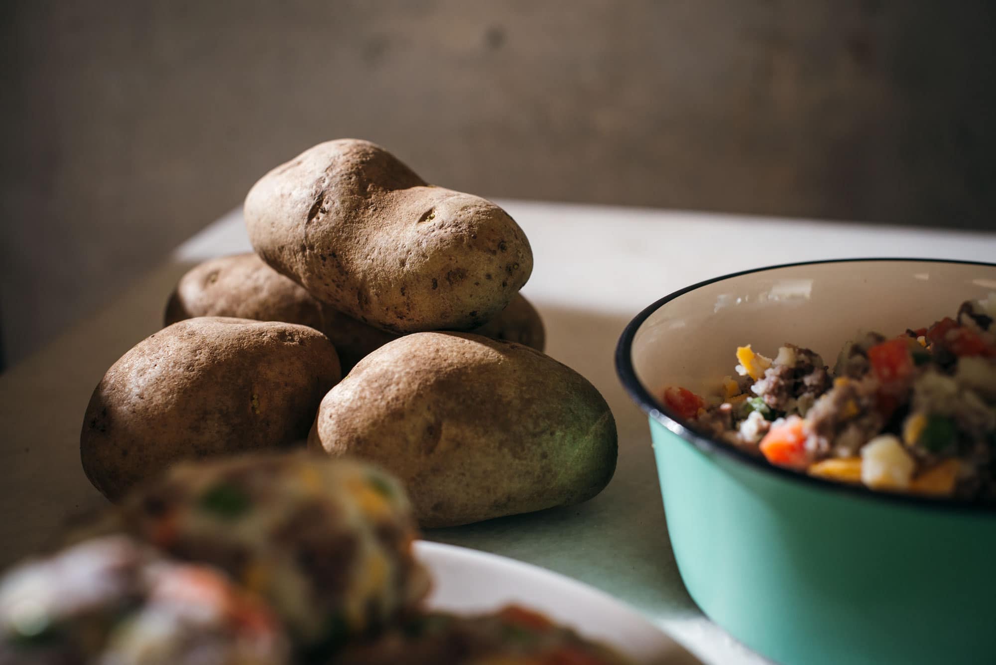 Idaho Potatoes on a white table